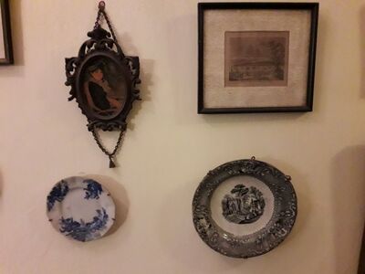 Drawing Room. Small Wall. Antique Plates. Decoupage.