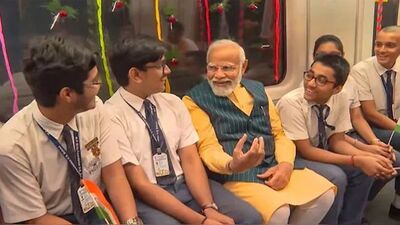 Prime Minister Narendra Modi with school students on board Indias first underwater metro in Kolkata